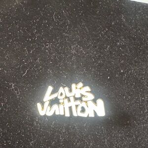 Louis Vuitton pin / brooch, Gold Script Logo white enamel signed in back
